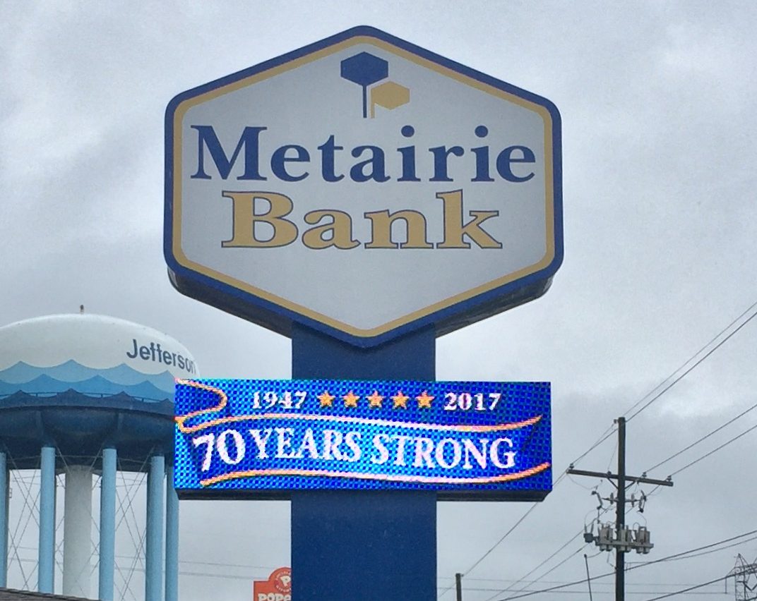 Electronic display and illuminated sign for Metairie Bank